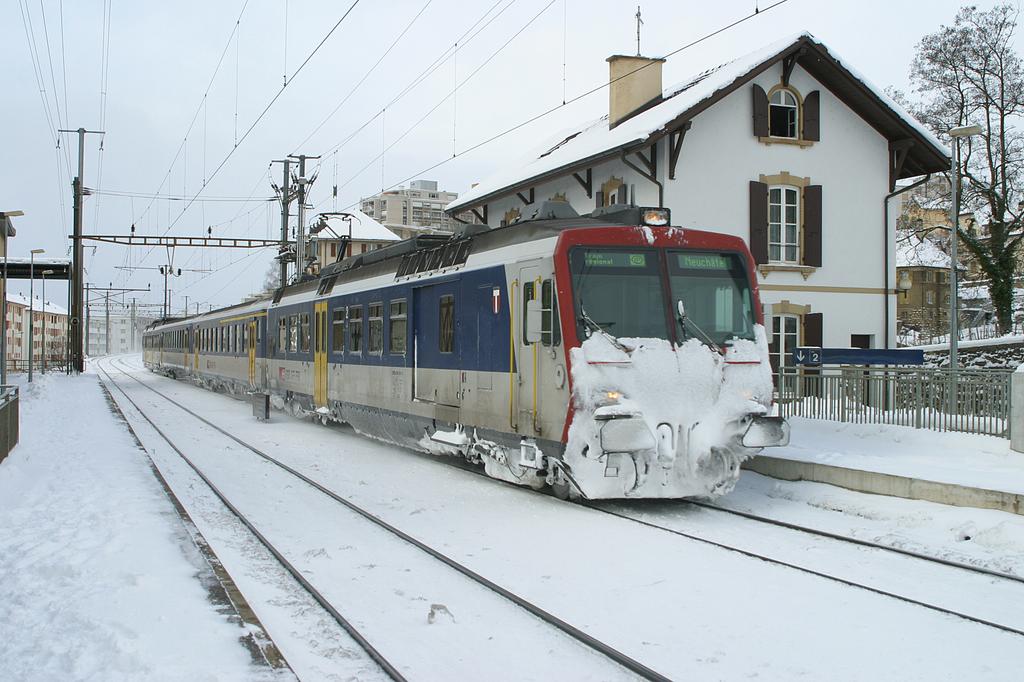 Photo d'une RBDe 560 001-083 100-135, Prise à Neuchâtel-Serrières le 29 janvier 2004 11:42
